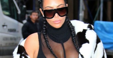 Kim Kardashian reveals ample cleavage in a sheer outfit