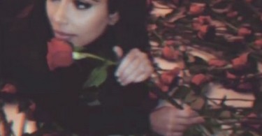 Kim Kardashian rolls around in a bed of Roses on Valentine 2016