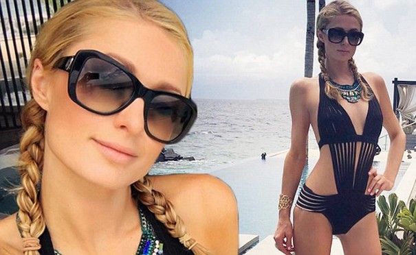 Paris Hilton Flaunts Her Sexy Figure in Swimwear