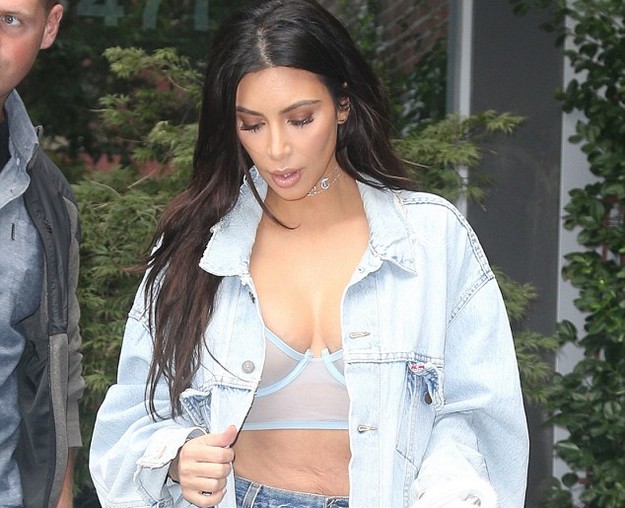 Kim Kardashian again wears no bra with racy sheer dress