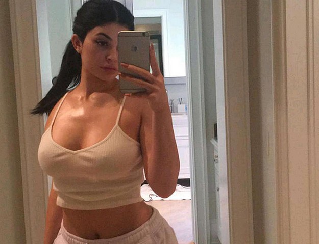 Kylie Jenner showcases her big breasts in a series of hot photos