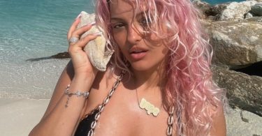 Bebe Rexha bikini mermaid look on the beach in Turks and Caicos
