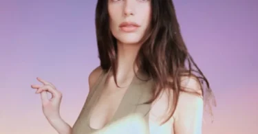 Camila Morrone wearing olive green dress on Instagram