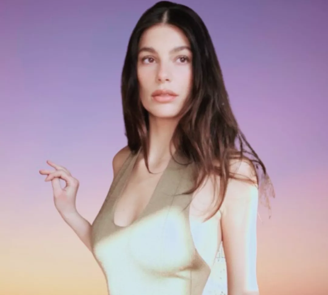 Camila Morrone wearing olive green dress on Instagram