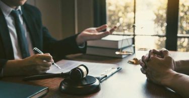 Client consulting a drug defence lawyer about legal case