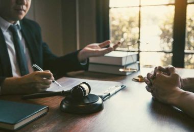 Client consulting a drug defence lawyer about legal case