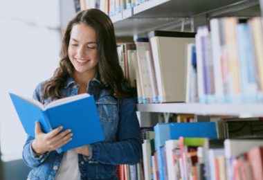 Person reading digital books online using an e-library platform